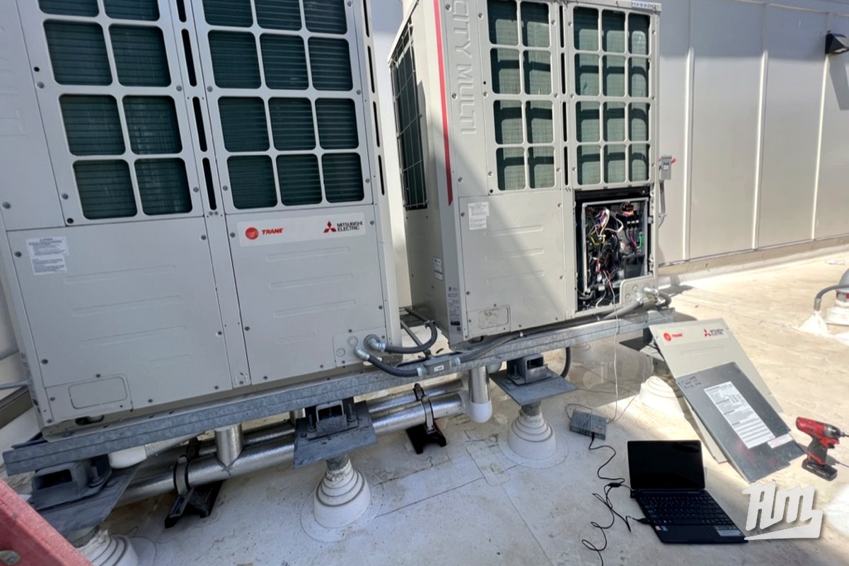 Mitsubishi VRF commissioning with laptop diagnostics